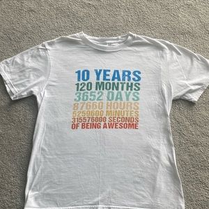 10 year old birthday t-shirt.  Worm once.  Size Youth Large brand Port Company.